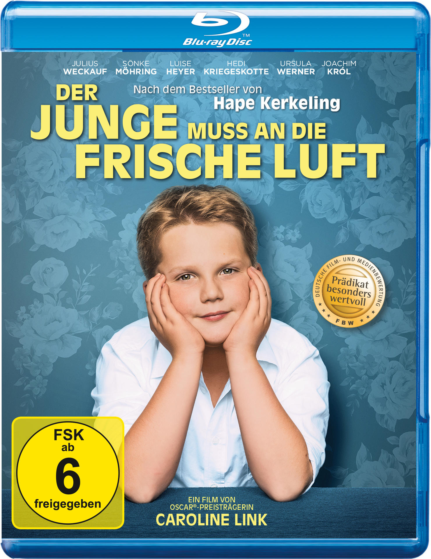 Blu-ray-Cover mit einem lächelnden Jungen. Der Titel lautet Der Junge Muss An Die Frische Luft.