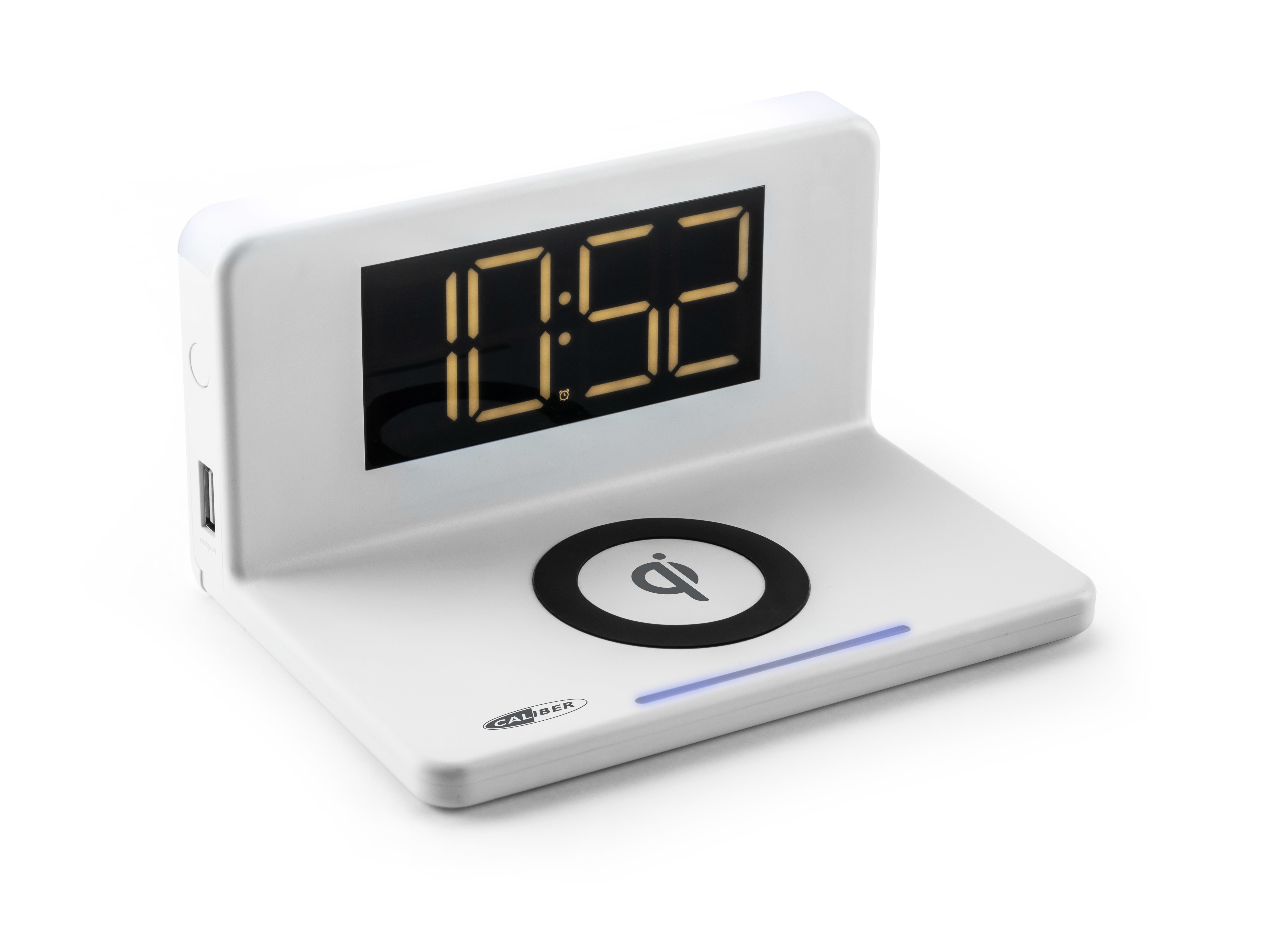 Weiße Digitaluhr mit kabellosem Ladegerät. Zeigt 10:52 an. USB-Anschluss links.