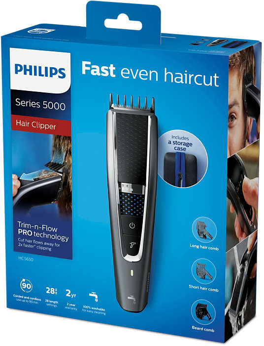 Egy Philips hajvágó doboz. A hajvágót mutatja, a haj pedig vágás alatt van. Tartozékokat is tartalmaz.