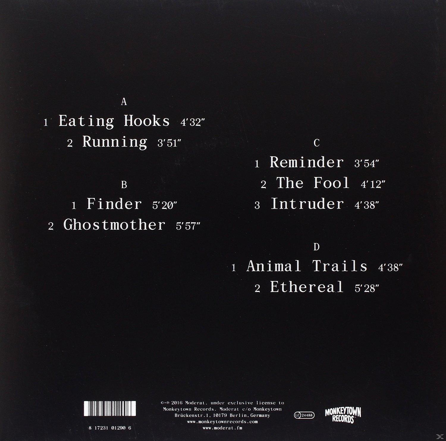 Album-Trackliste auf schwarzem Hintergrund. Jede Seite listet mehrere Songtitel auf.