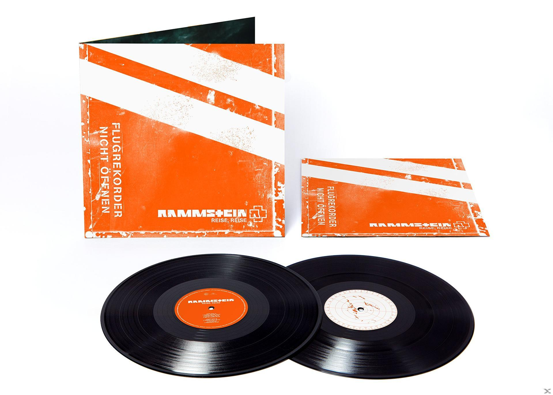 Albumhoes en vinylplaten met oranje tekst.