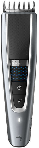 Silver electric hair trimmer with a black panel and digital settings.