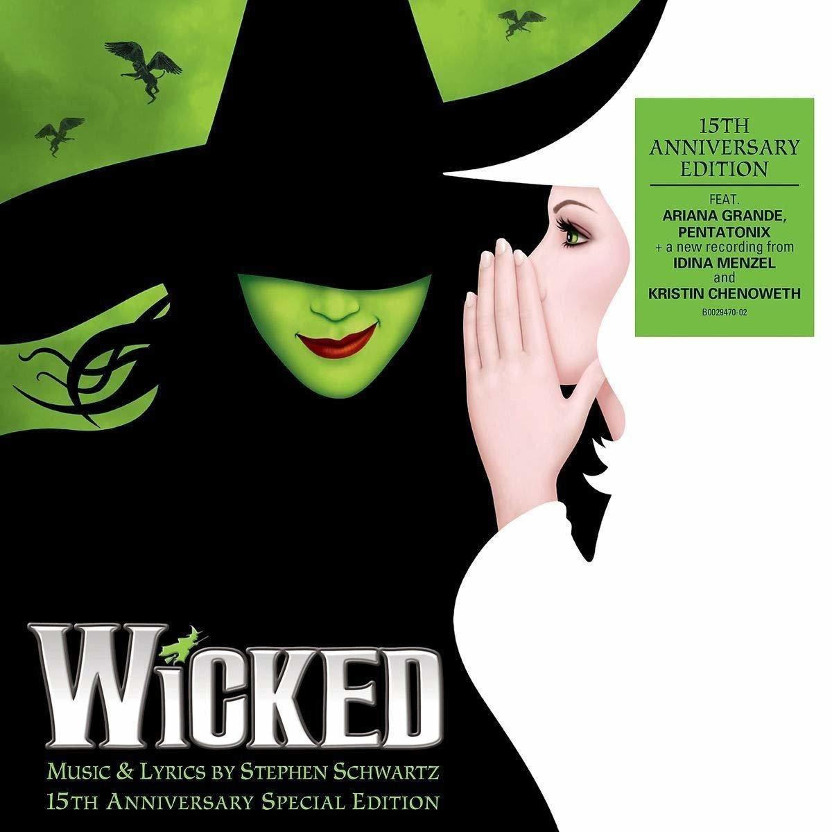 Albumcover für Wicked. Ein grünes Gesicht mit schwarzem Hut und ein anderes Gesicht mit weißer Haut.
