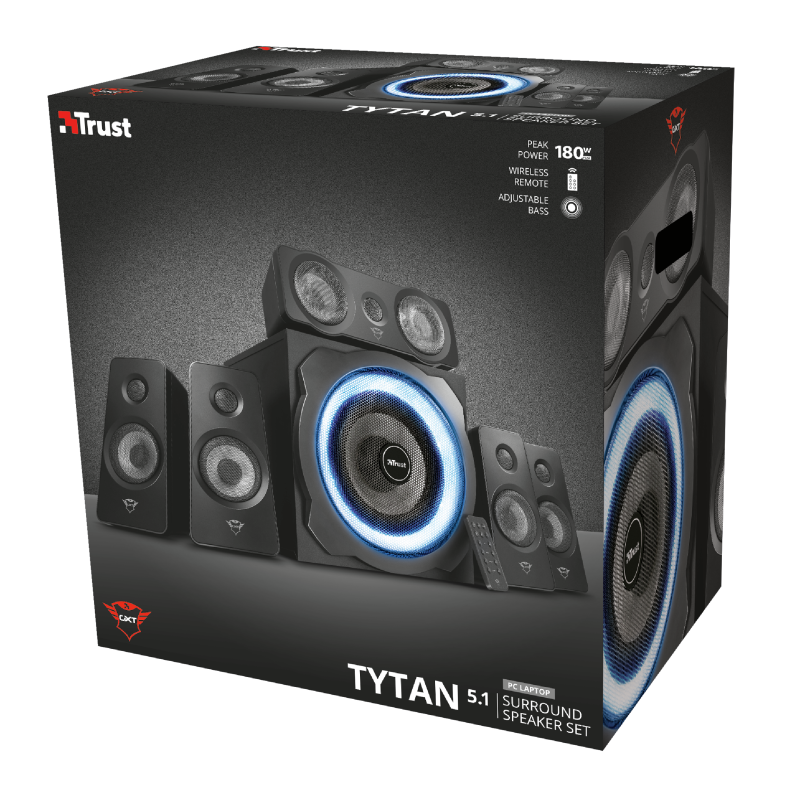 Ein verpacktes 5.1 Surround-Sound-Lautsprecherset. Die Box zeigt Lautsprecher und eine Fernbedienung mit blauem Schein.