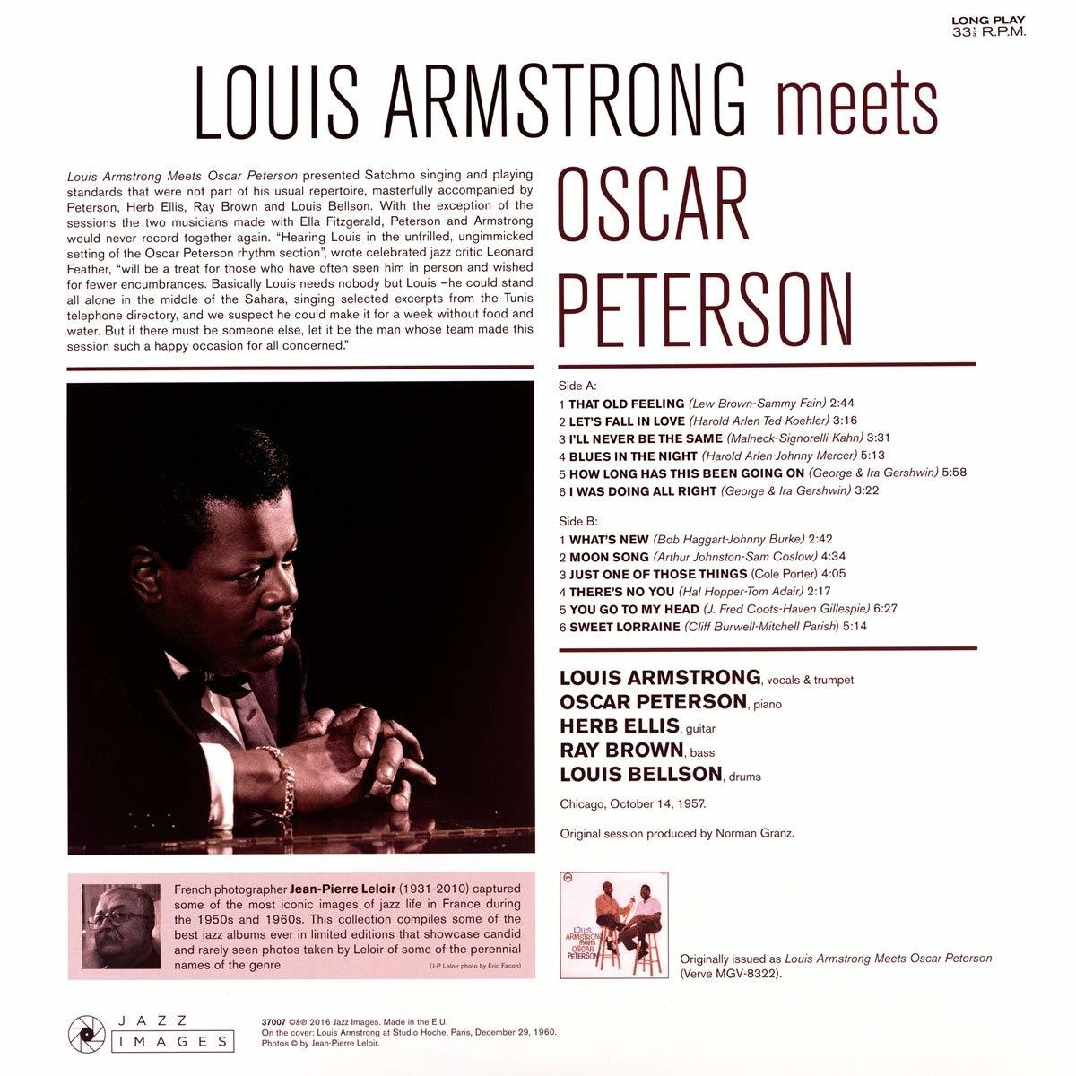 Louis Armstrong meets Oscar Peterson album borítója. Fényképet tartalmaz róluk és szöveget.