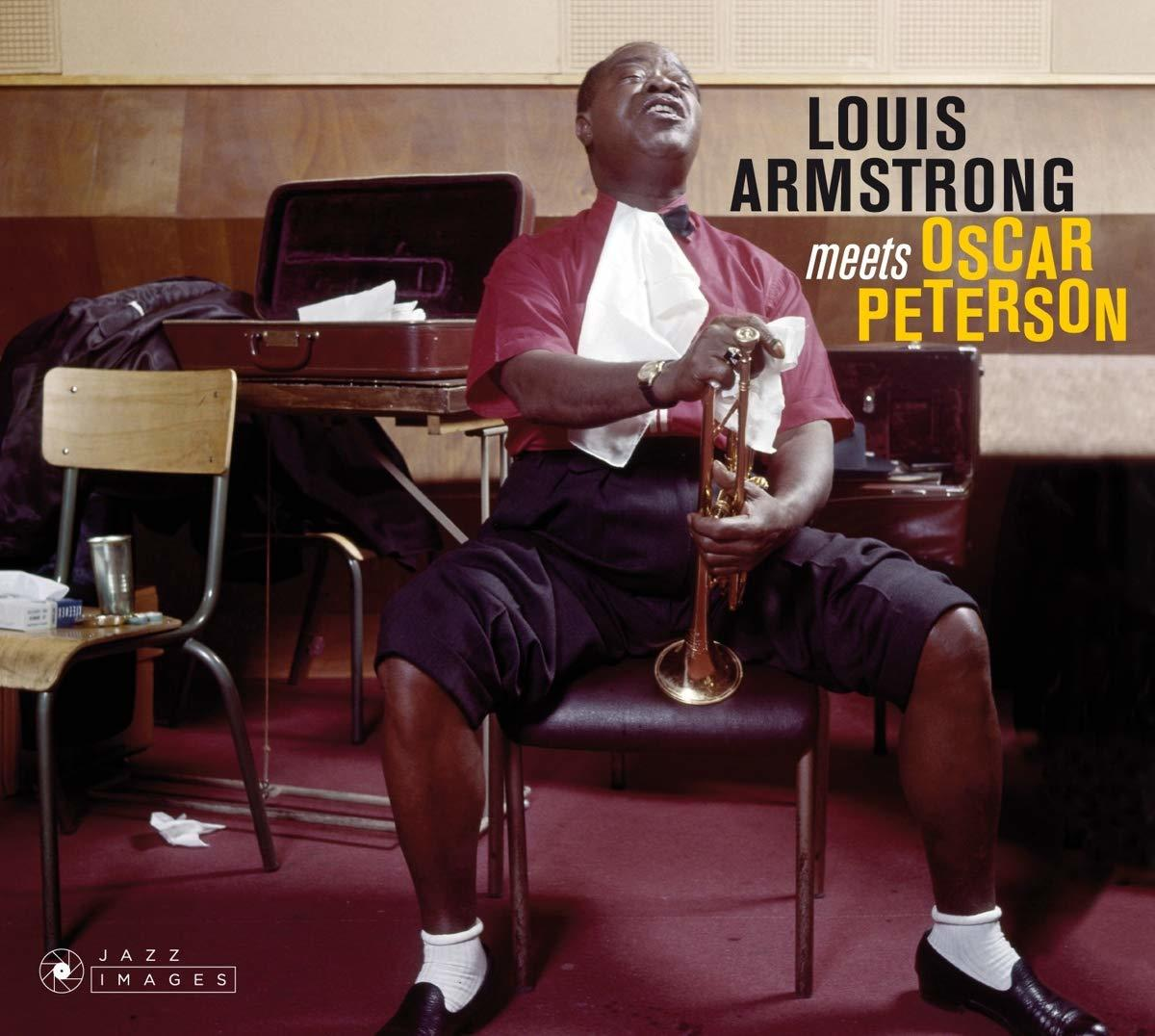 Louis Armstrong album borító: Férfi trombitát tart, ül, 'Louis Armstrong meets Oscar Peterson' szöveggel.