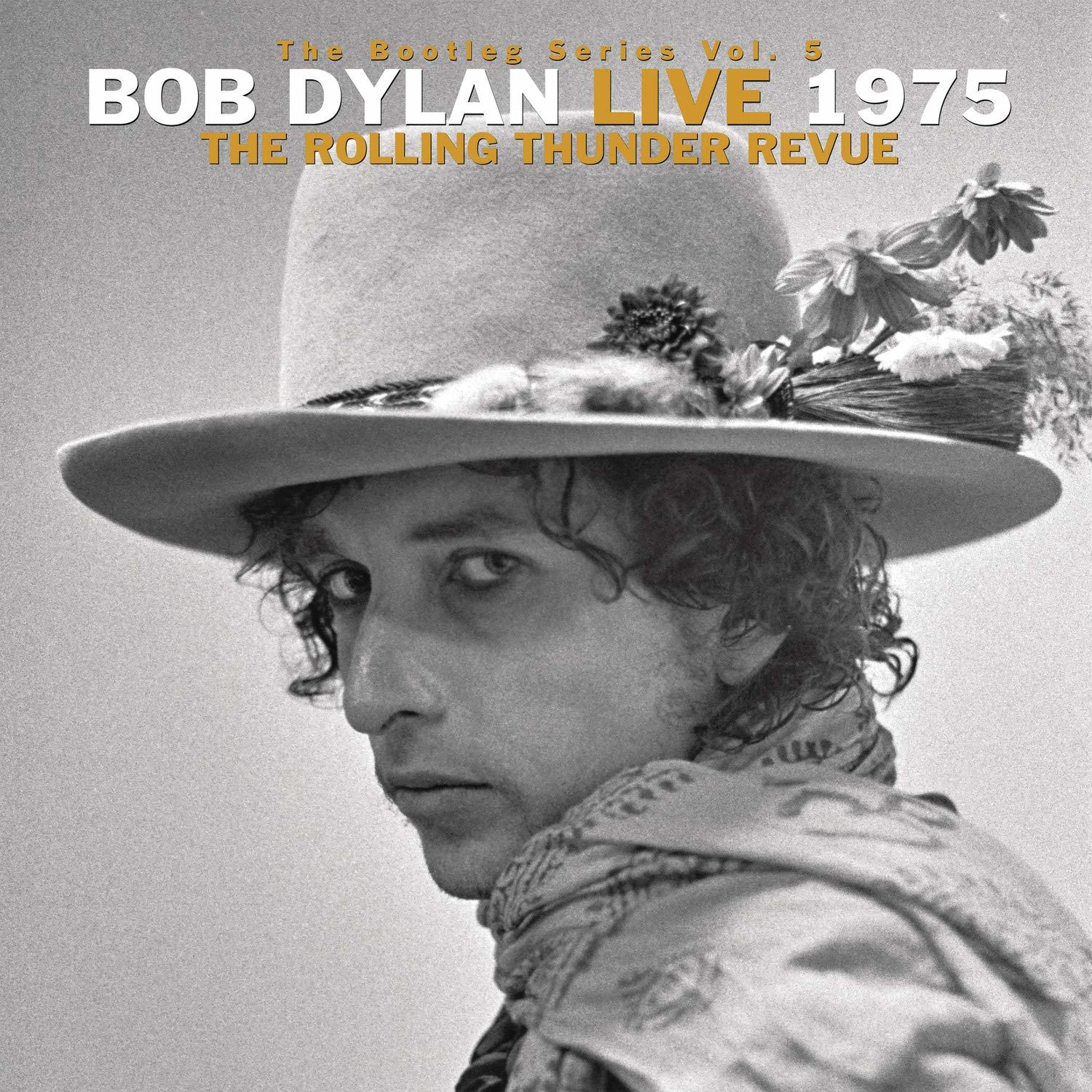 Bob Dylan album borító. Fekete-fehér fotó Dylan-ről, kalapban, virágokkal.