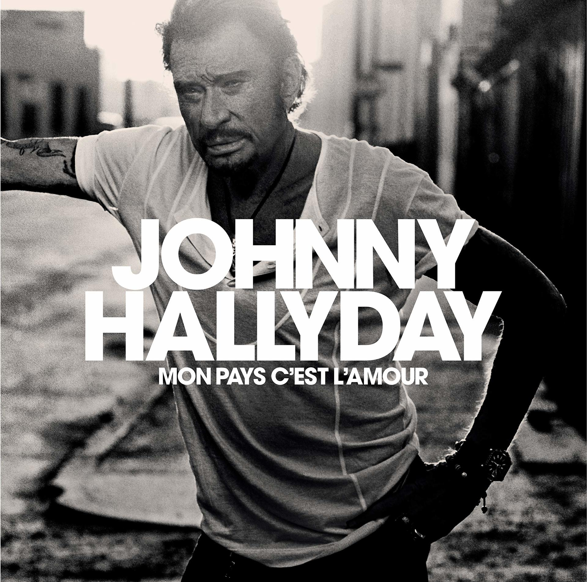 Pochette d'album de Johnny Hallyday. Photo en noir et blanc de Hallyday, superposition de texte.