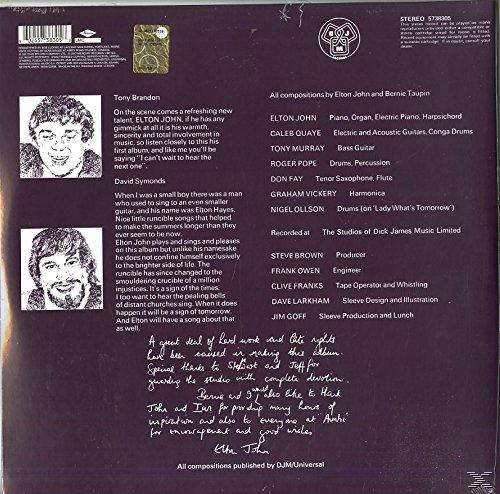 Album borítója Elton John portréjával, stáblistával és kézírásos jegyzetekkel sötét háttéren.