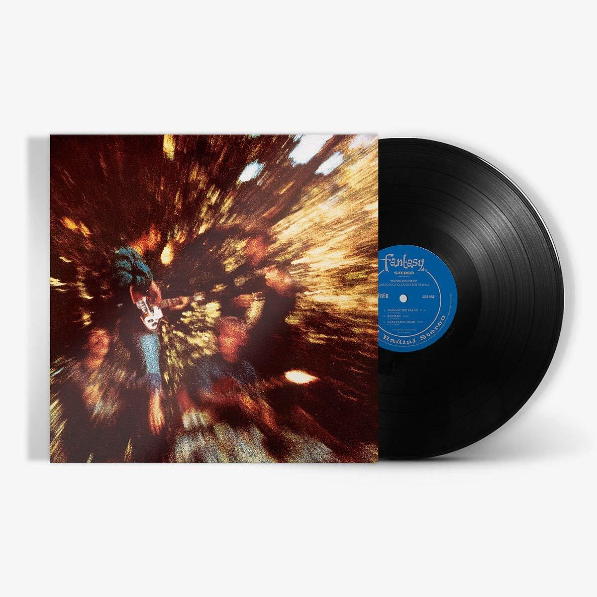 Egy lemez album borítója, egy zenekarral, absztrakt designnal.