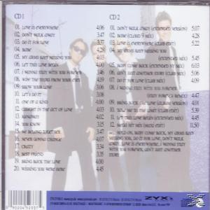 Rückseite eines Albums. Drei Personen sind auf dem Cover zu sehen.