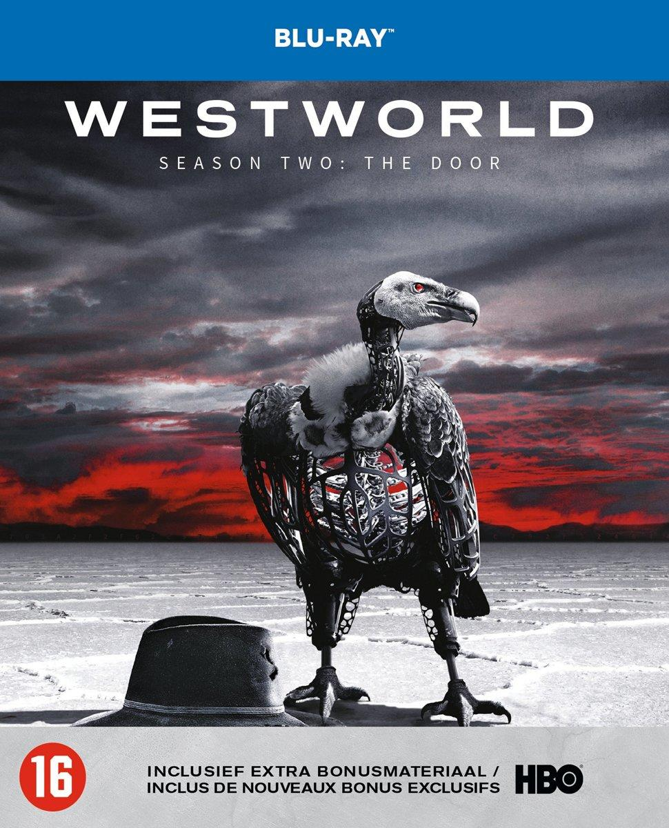 Blu-ray-cover van Westworld, seizoen 2. Een robotvogel staat in een woestijnlandschap bij zonsondergang.