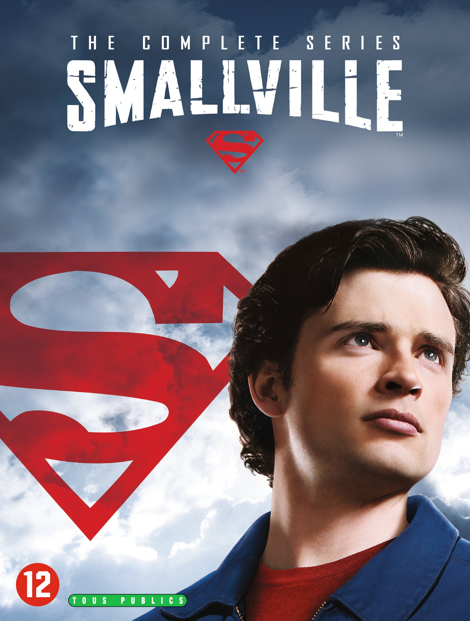 Cover van de Smallville serie met een gezicht van een man; Superman logo in rood.