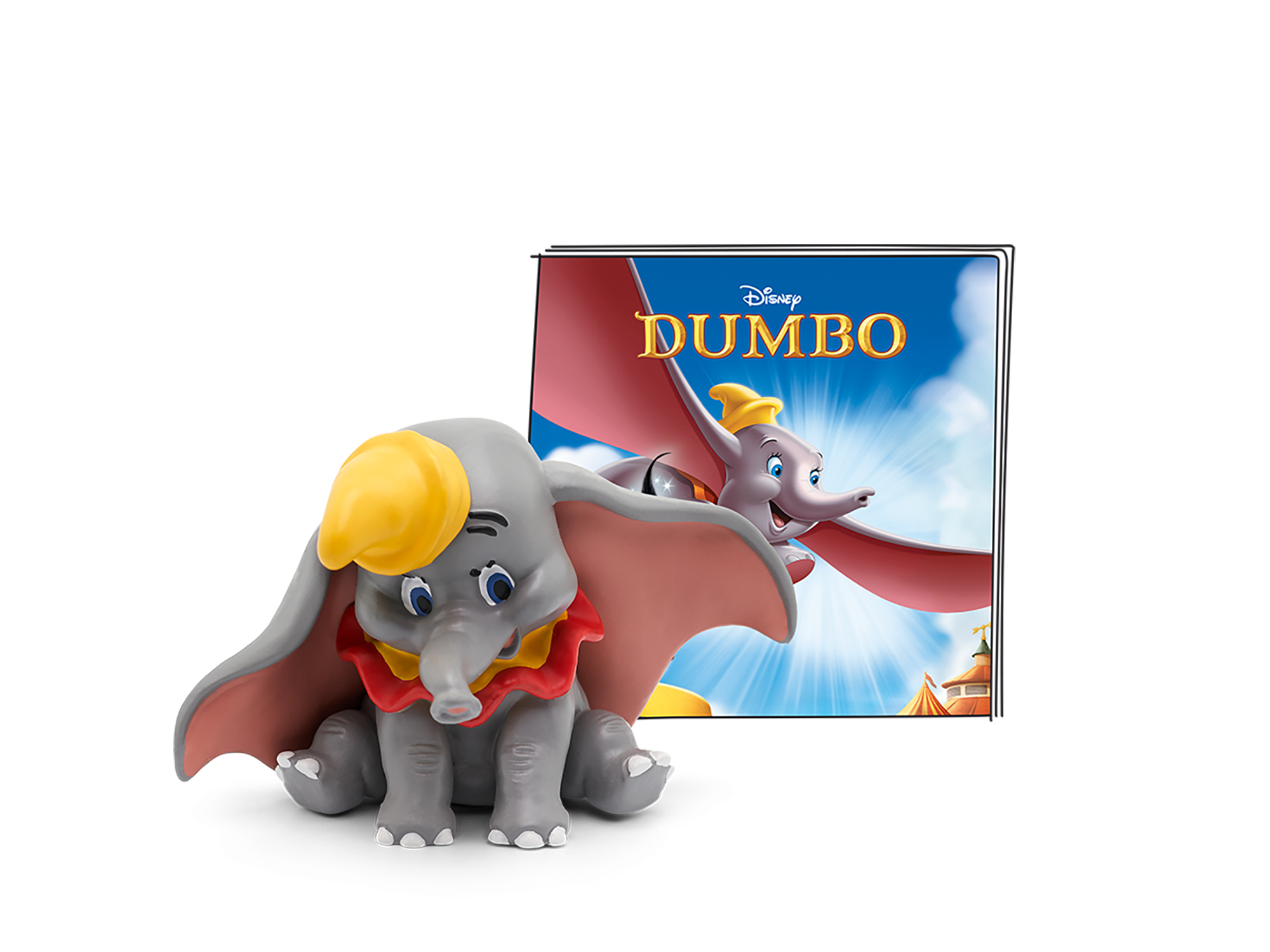 Dumbo Spielzeug-Elefant und Buchcover. Der Elefant ist grau und gelb, das Buch ist blau.