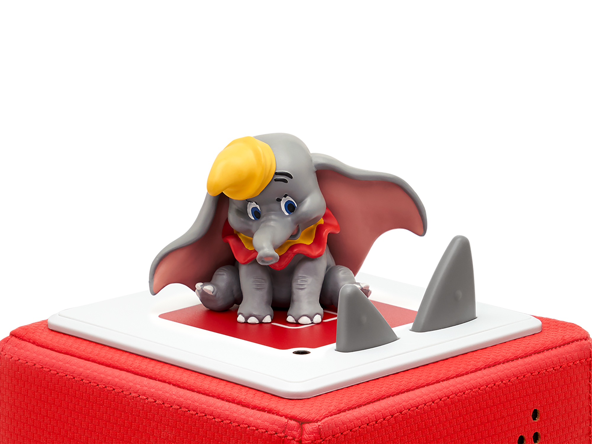 Dumbo-Spielzeug auf roter Basis mit Haifischflossen.