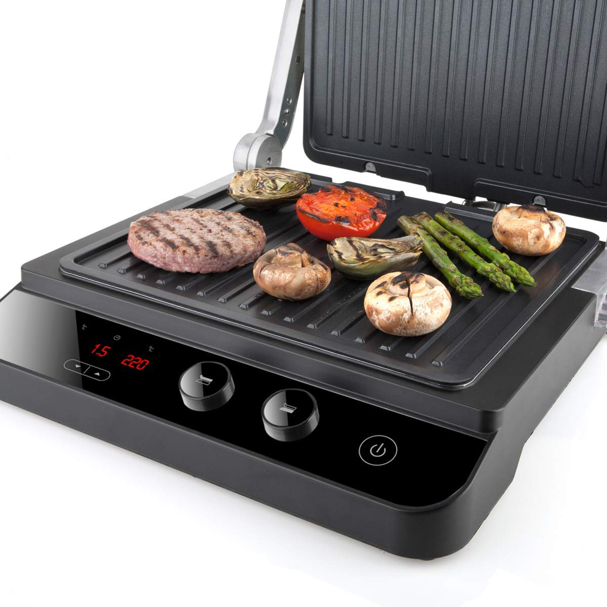 Parrilla eléctrica con comida: hamburguesa, verduras y champiñones.