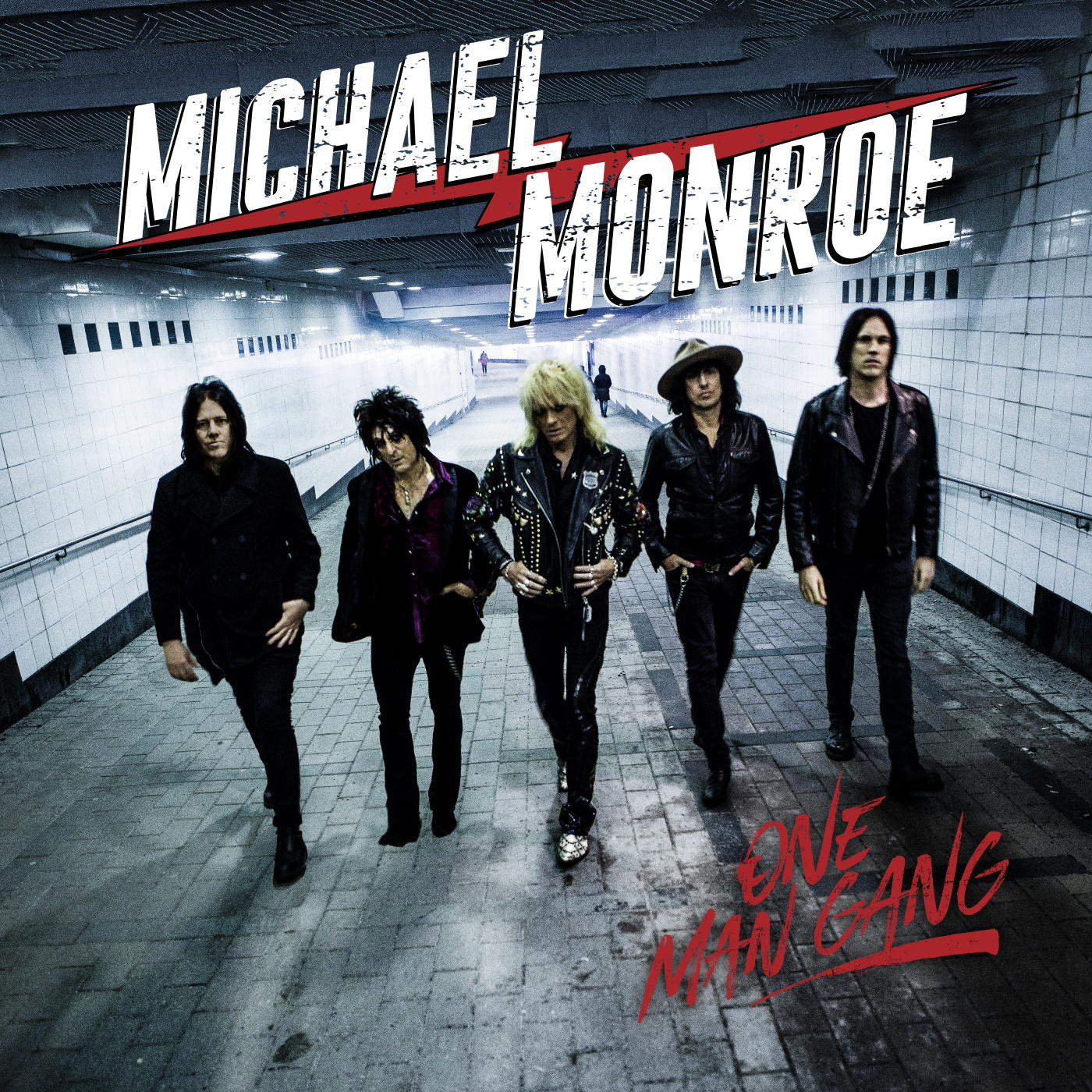 Pochette d'album : Michael Monroe et le groupe. Cinq hommes marchent dans un tunnel, texte rouge.