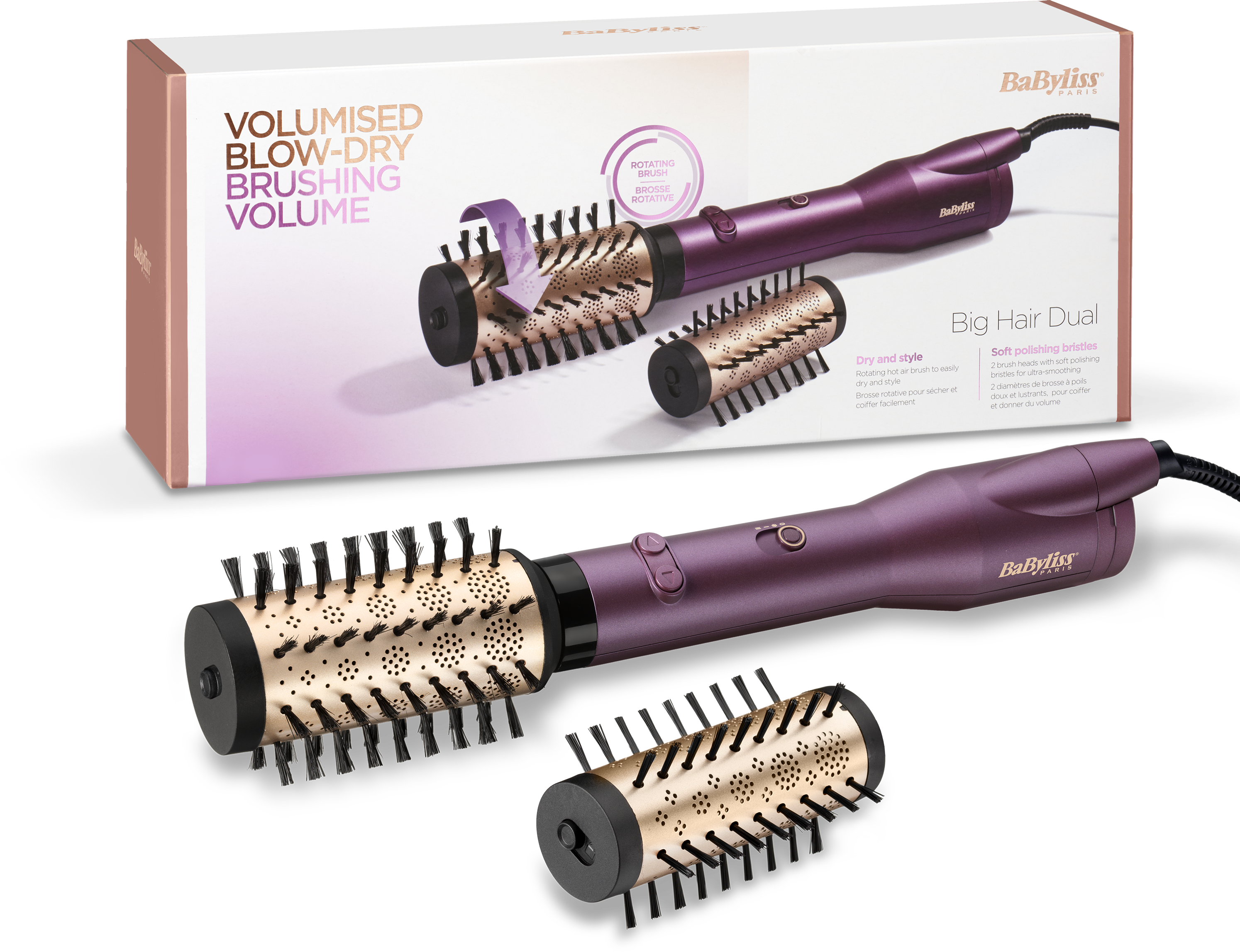 Un ensemble d'outils de coiffure Babyliss avec deux têtes de brosse et une poignée principale, avec emballage en arrière-plan.