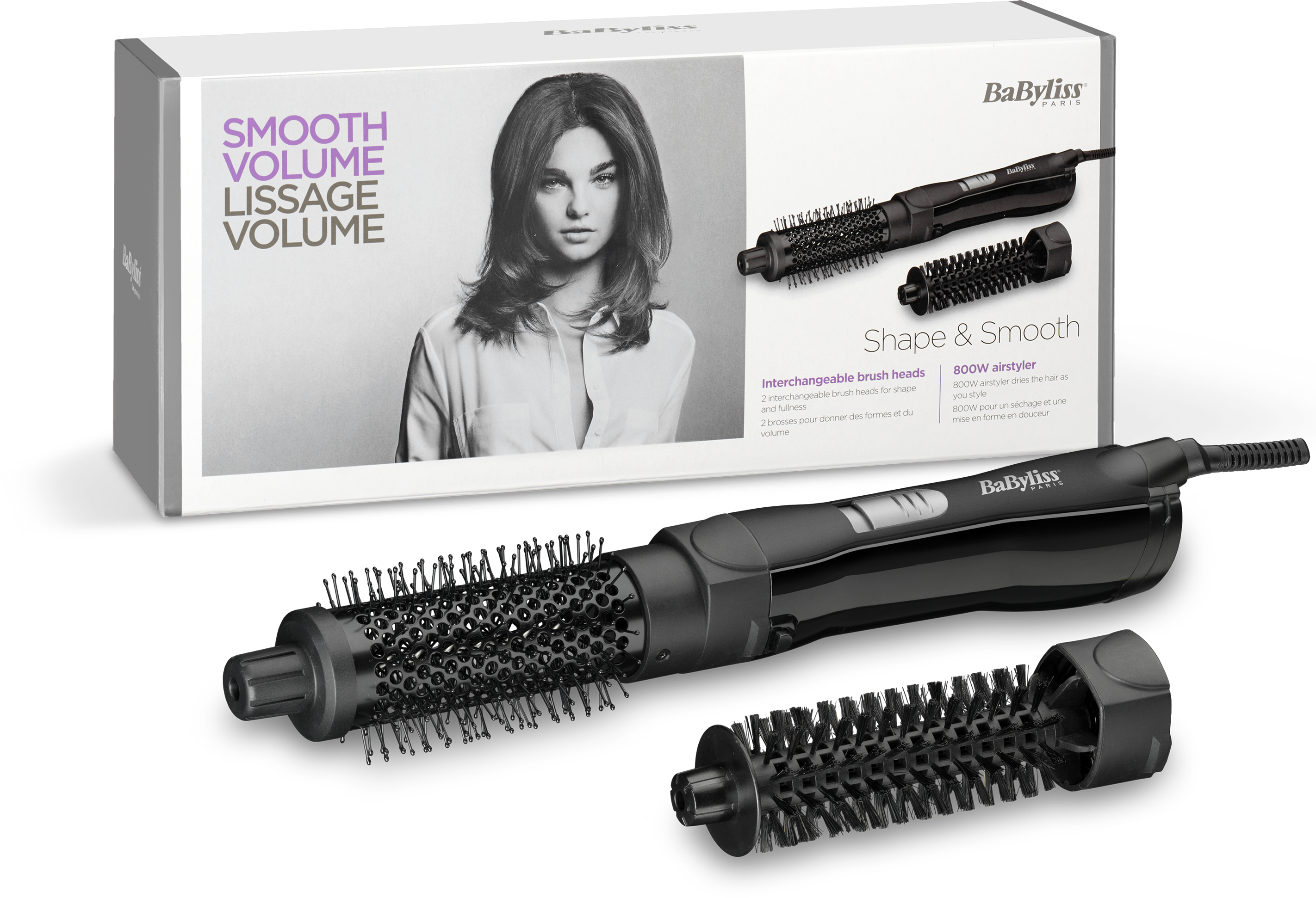 Boîte avec des outils de coiffure : un sèche-cheveux et deux têtes de brosse interchangeables. Le visage d'une femme est sur la boîte.