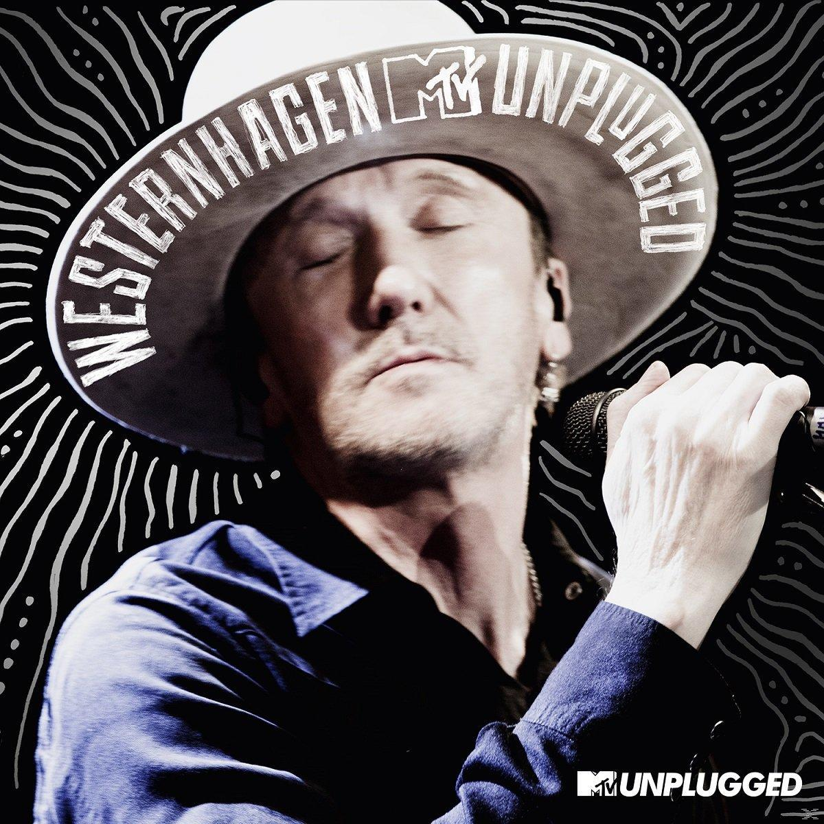 MTV Unplugged Albumcover von Westernhagen, mit einem Mann, der in ein Mikrofon singt.