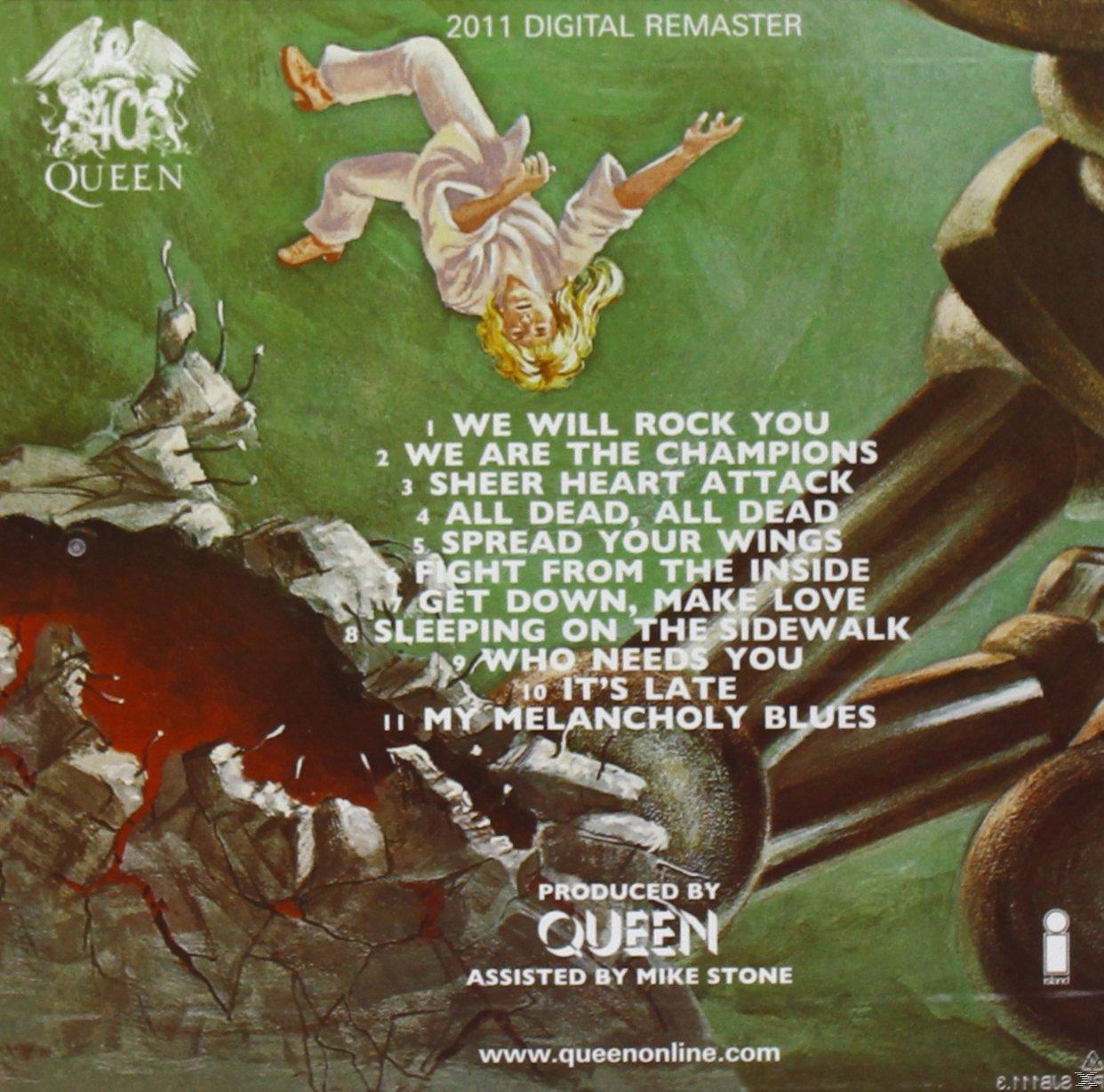 Queen-Albumcover. Es zeigt die Titelliste des Albums, eine Zeichnung einer fallenden Figur und ein großes Monster.