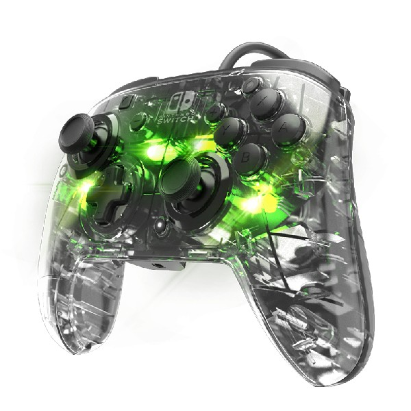 Mando Switch transparente con luces verdes. Botones y joysticks negros.