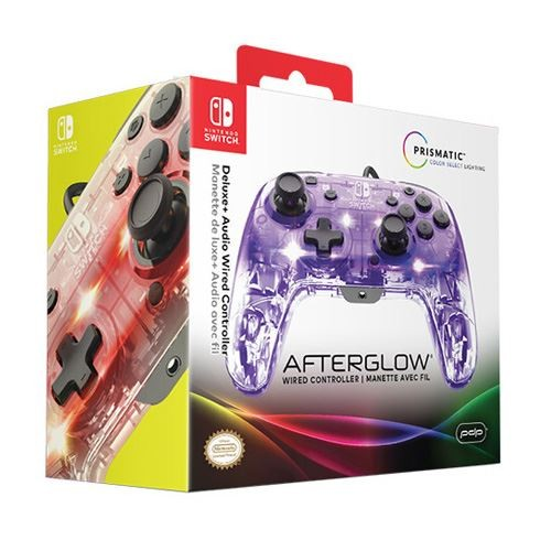 Un mando de Nintendo Switch en una caja. El mando es translúcido y tiene luces de colores.
