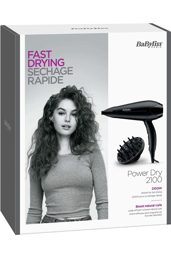 Doos met een vrouw en een haardroger. De doos is wit en zwart met paarse tekst. De vrouw heeft krullend haar.