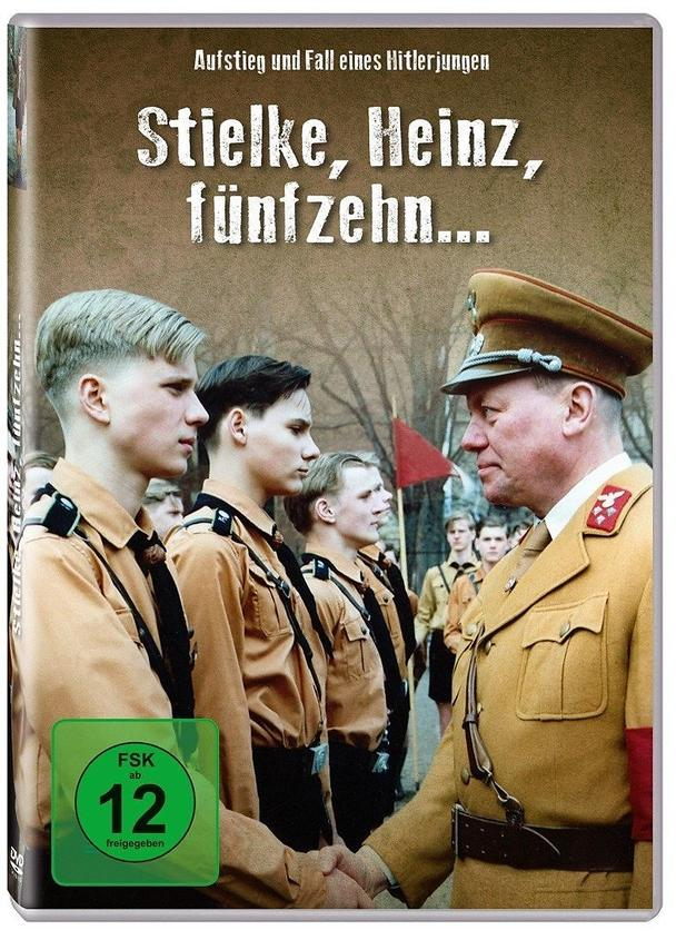 DVD-Cover: Männer in Nazi-Uniformen mit einem Mann in brauner Uniform, der die Hand schüttelt.