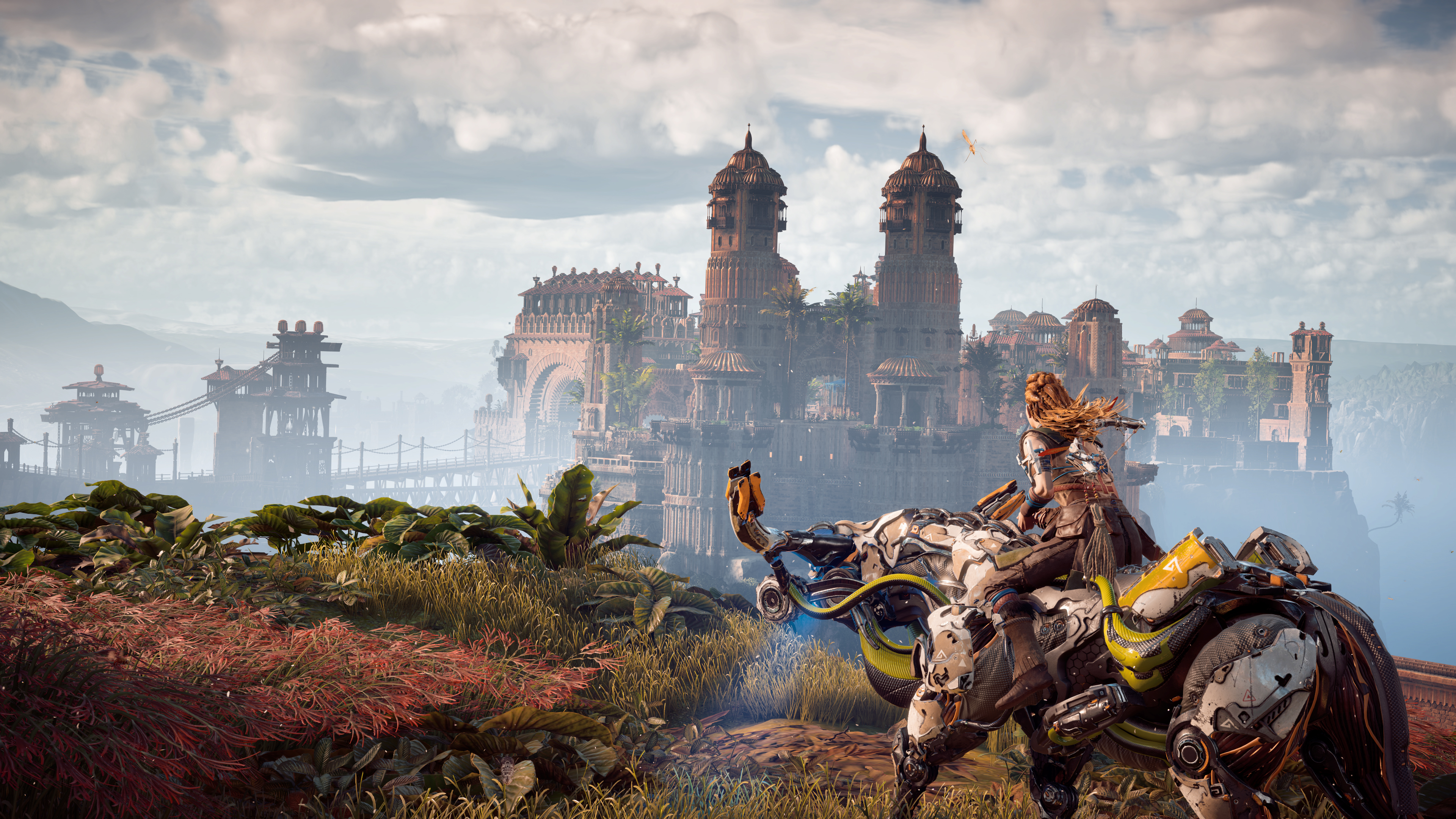 Horizon Zero Dawn Spielszene. Frau auf einem Roboterpferd, in futuristischer Landschaft.
