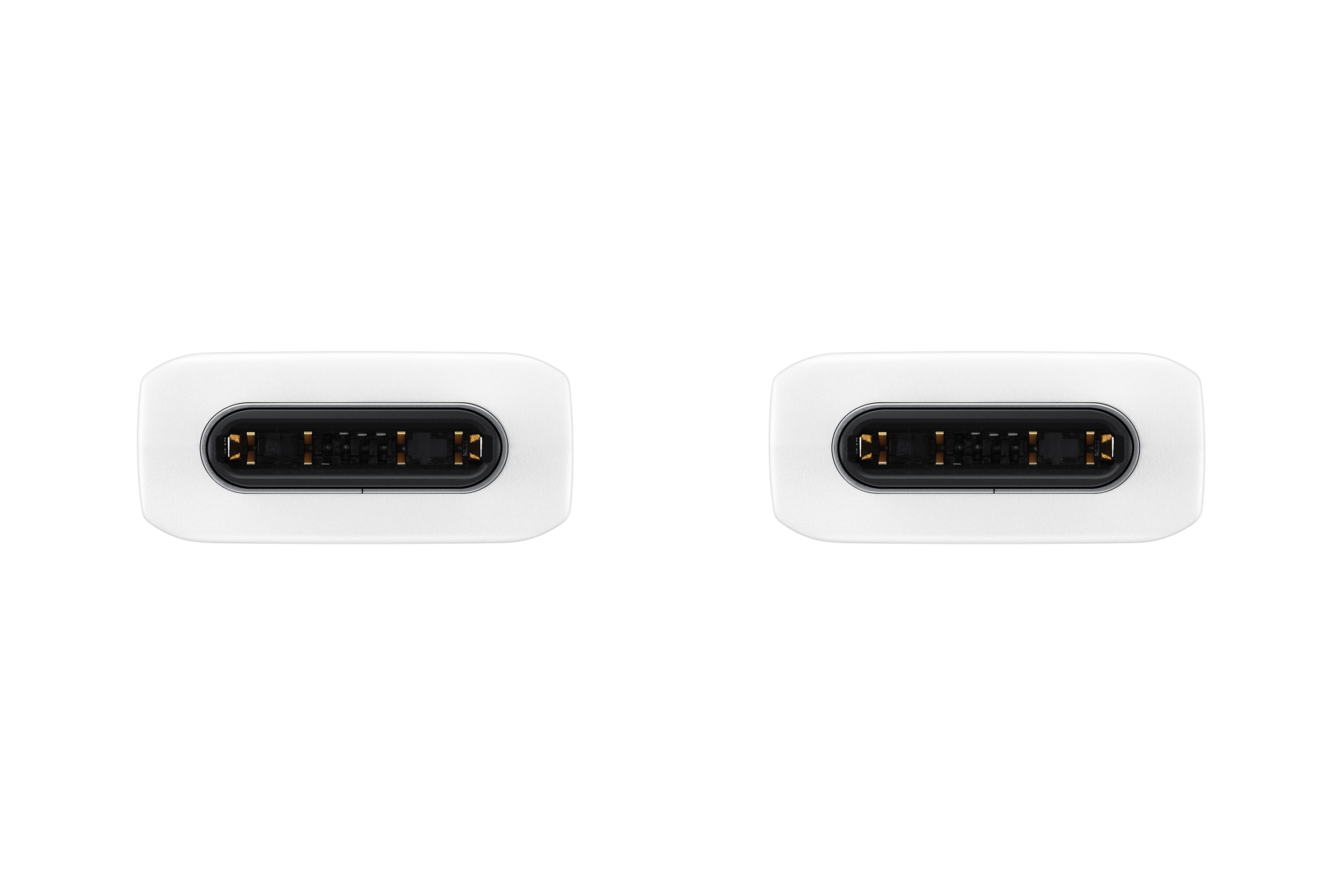 Two white charging ports with black interiors, side by side on a black surface.