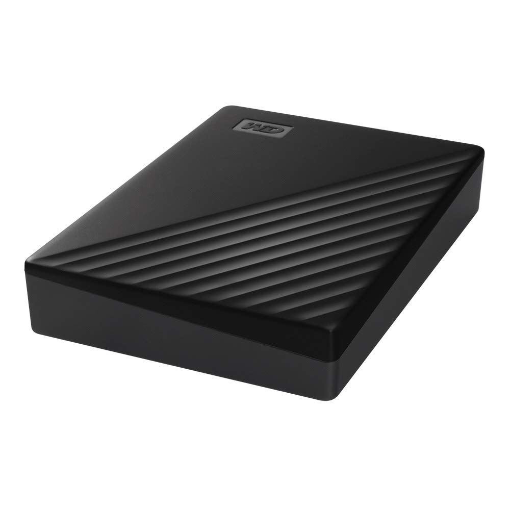 Disco duro externo WD negro con parte superior texturizada, aislado sobre fondo blanco.