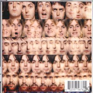 Albumcover mit mehreren Bildern eines Mannesgesichts, angeordnet in einem Rastermuster.