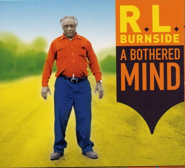 R.L. Burnside, Albumcover für A Bothered Mind. Mann in orangefarbenem Hemd, blauer Hose.