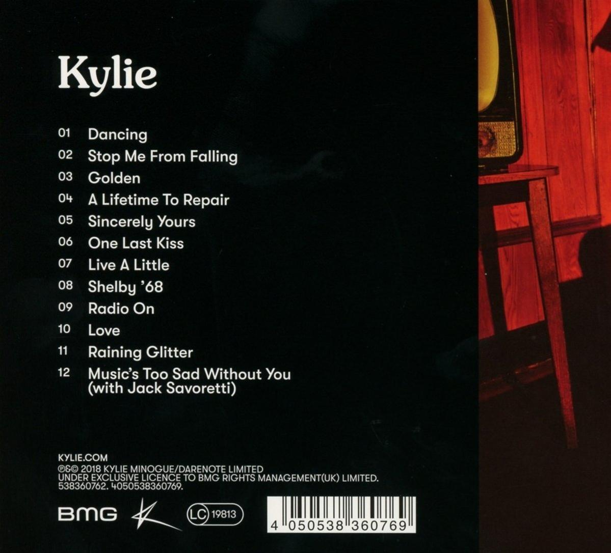 CD hátlap, Kylie album számlista. Fekete háttér, piros elemek. Rádió bekapcsolva.