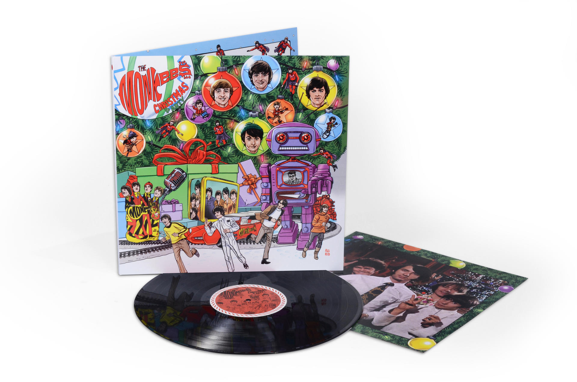 Albumcover von The Monkees' Weihnachtsalbum. Enthält eine Schallplatte, Cover-Art und einen zusätzlichen Einsatz.