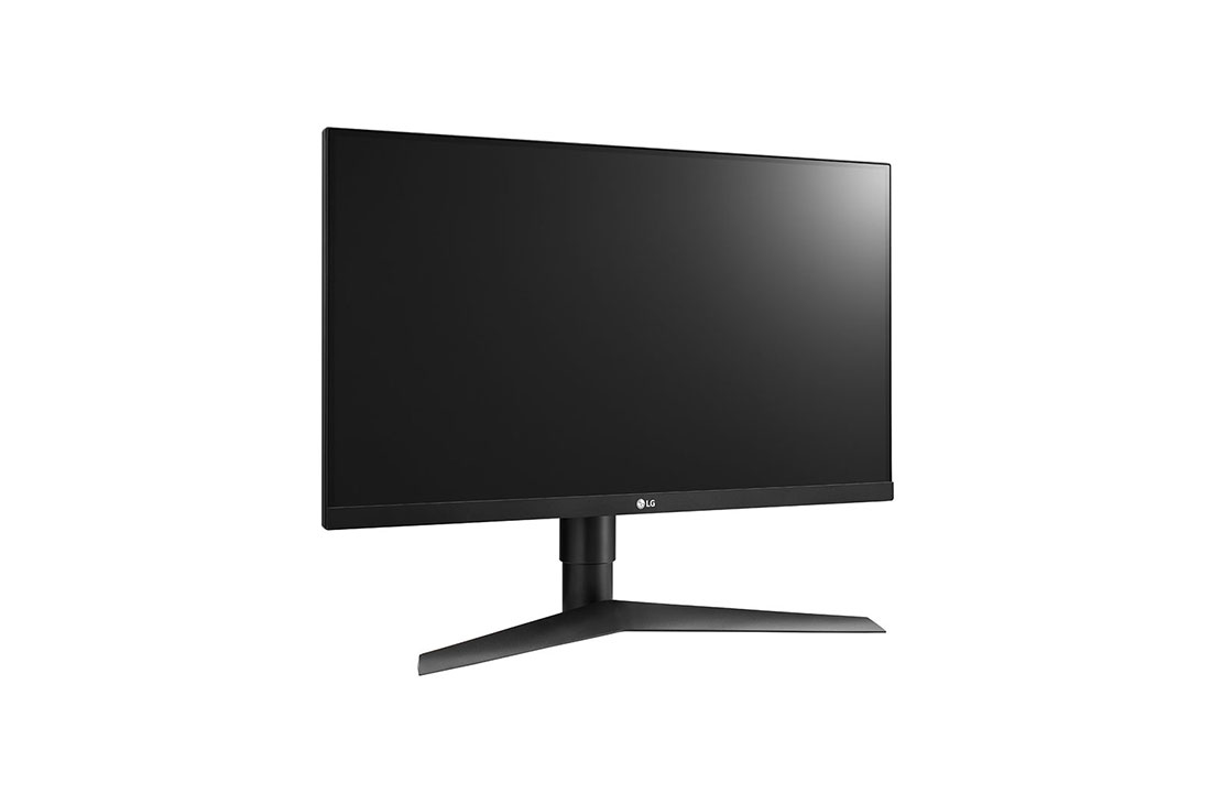 Monitor de ordenador LG negro sobre una superficie blanca.