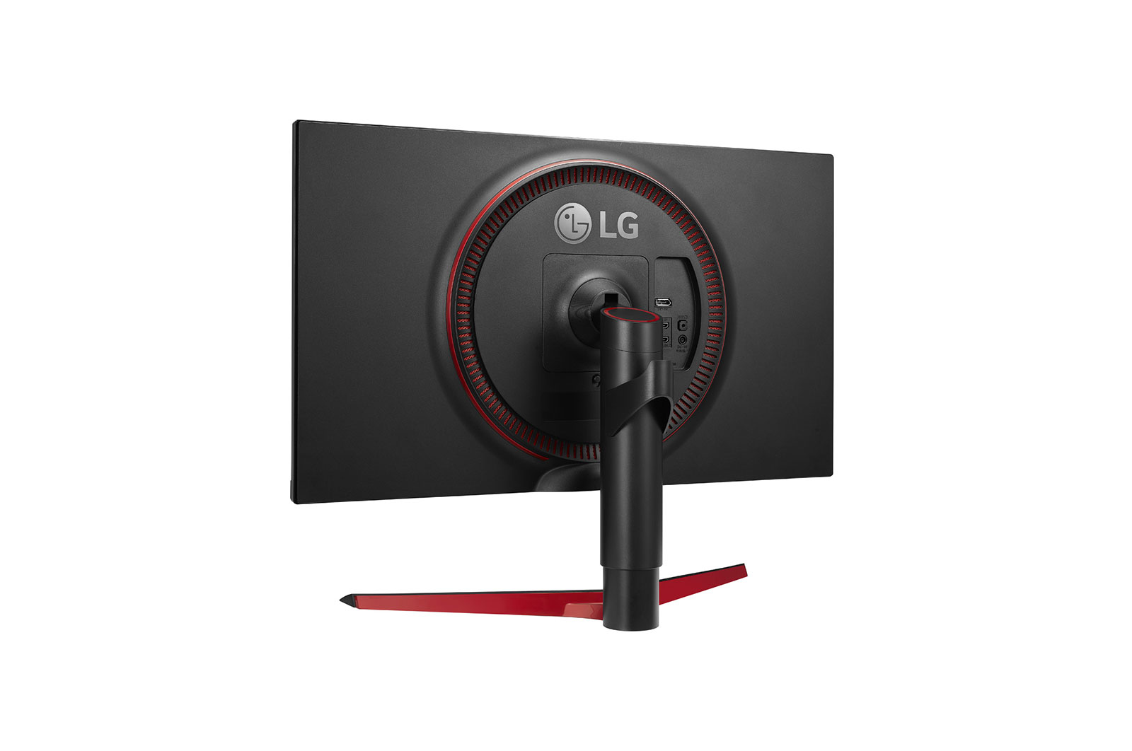 Vista trasera de un monitor LG negro con detalles rojos sobre una superficie blanca.