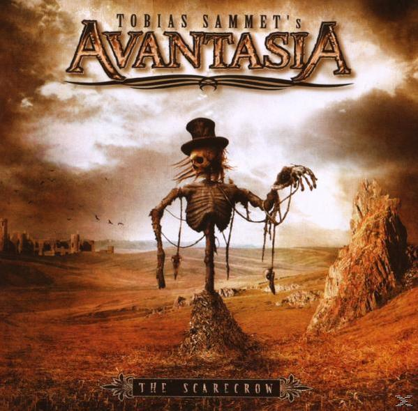 Albumcover mit Vogelscheuche. Vogelscheuche mit Zylinder, auf einem Feld. Dunkler Himmel, Text AVANTASIA.
