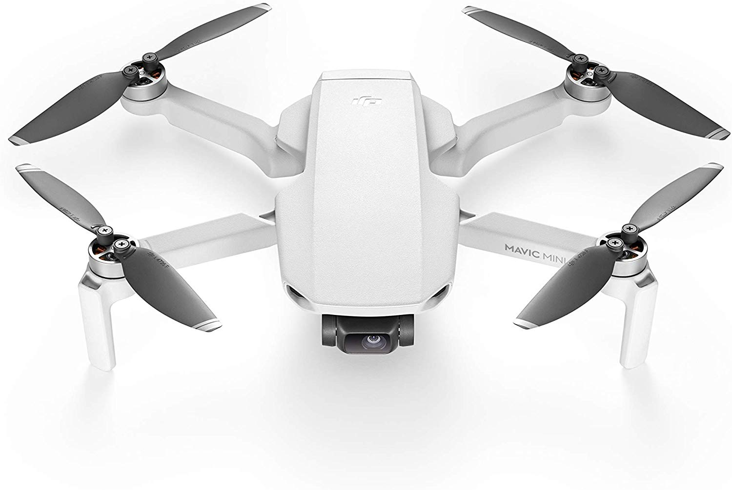 Dron blanco con cuatro hélices. Tiene una cámara debajo del cuerpo. El dron está sobre una superficie blanca.
