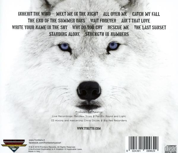 Albumcover mit Wolfsgesicht und Songtiteln.