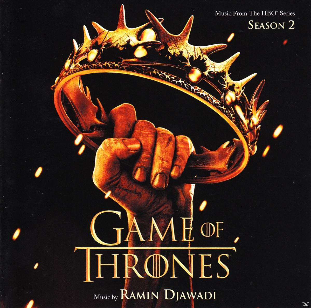 Game of Thrones Musik-CD-Cover. Eine Hand hält eine goldene Krone auf schwarzem Grund.