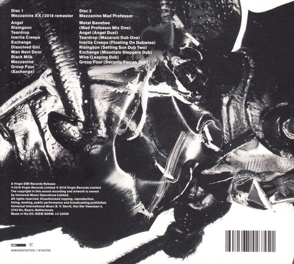 Album borító: 1. és 2. lemez számlistái előadóval és album címmel. Sötét, absztrakt háttér.