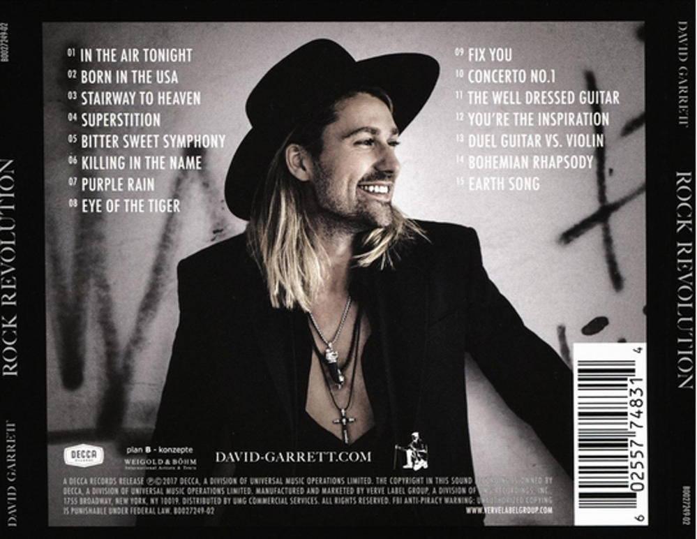 CD-Cover mit einem Mann mit Hut, der lächelt, mit Titelliste und dem Albumtitel 'ROCK REVOLUTION'.