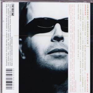 Die Rückseite einer CD mit einer Nahaufnahme eines Mannes mit Sonnenbrille und Text.