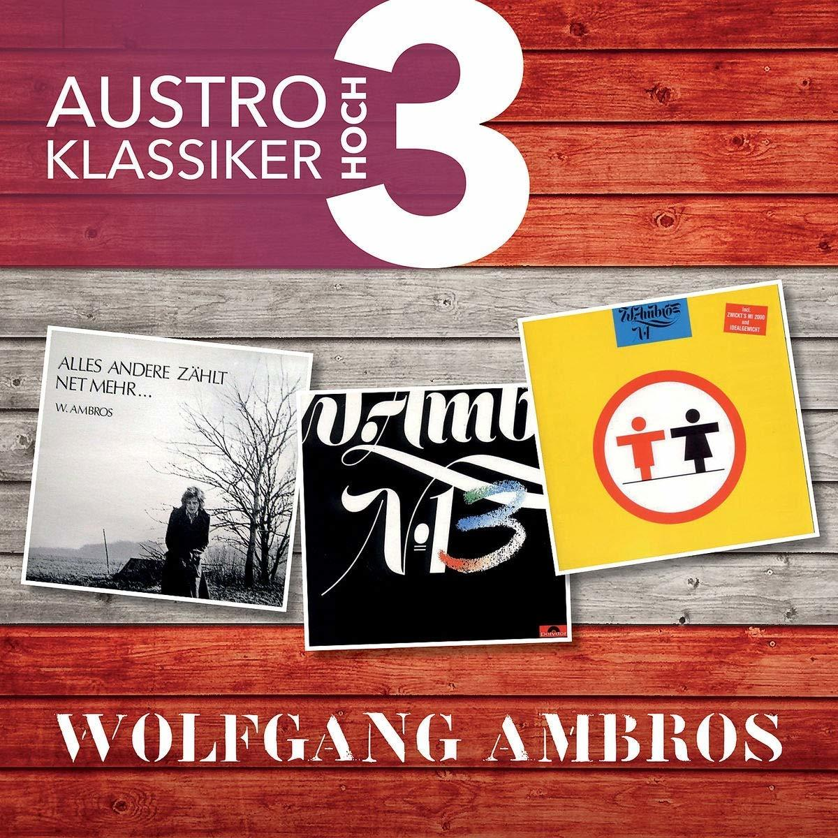 Albumcover. Drei Albumcover auf einem Holzgrund mit Text.