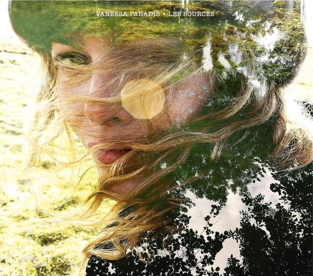 Albumcover, Vanessa Paradis, Les Sources, mit Frauenporträt und Baum-Overlay.
