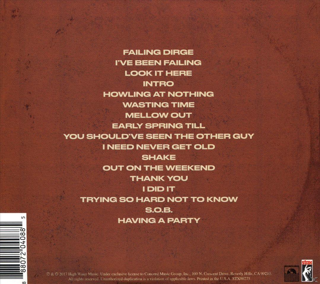 Albumhoes met songtitels in bruine tekst op een bruine achtergrond.