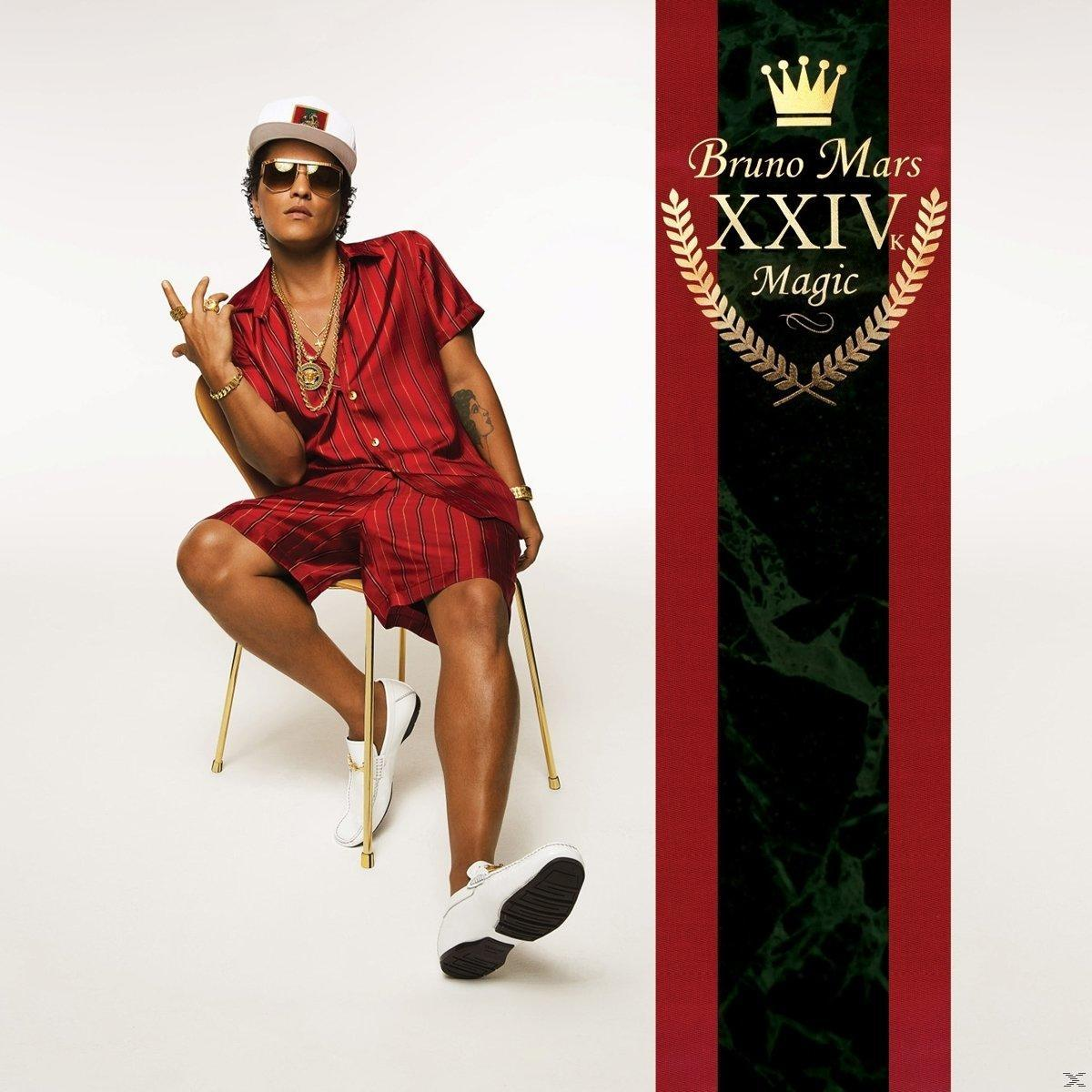 Albumcover: Bruno Mars in rotem Outfit, auf einem goldenen Stuhl sitzend, und ein Textblock rechts.
