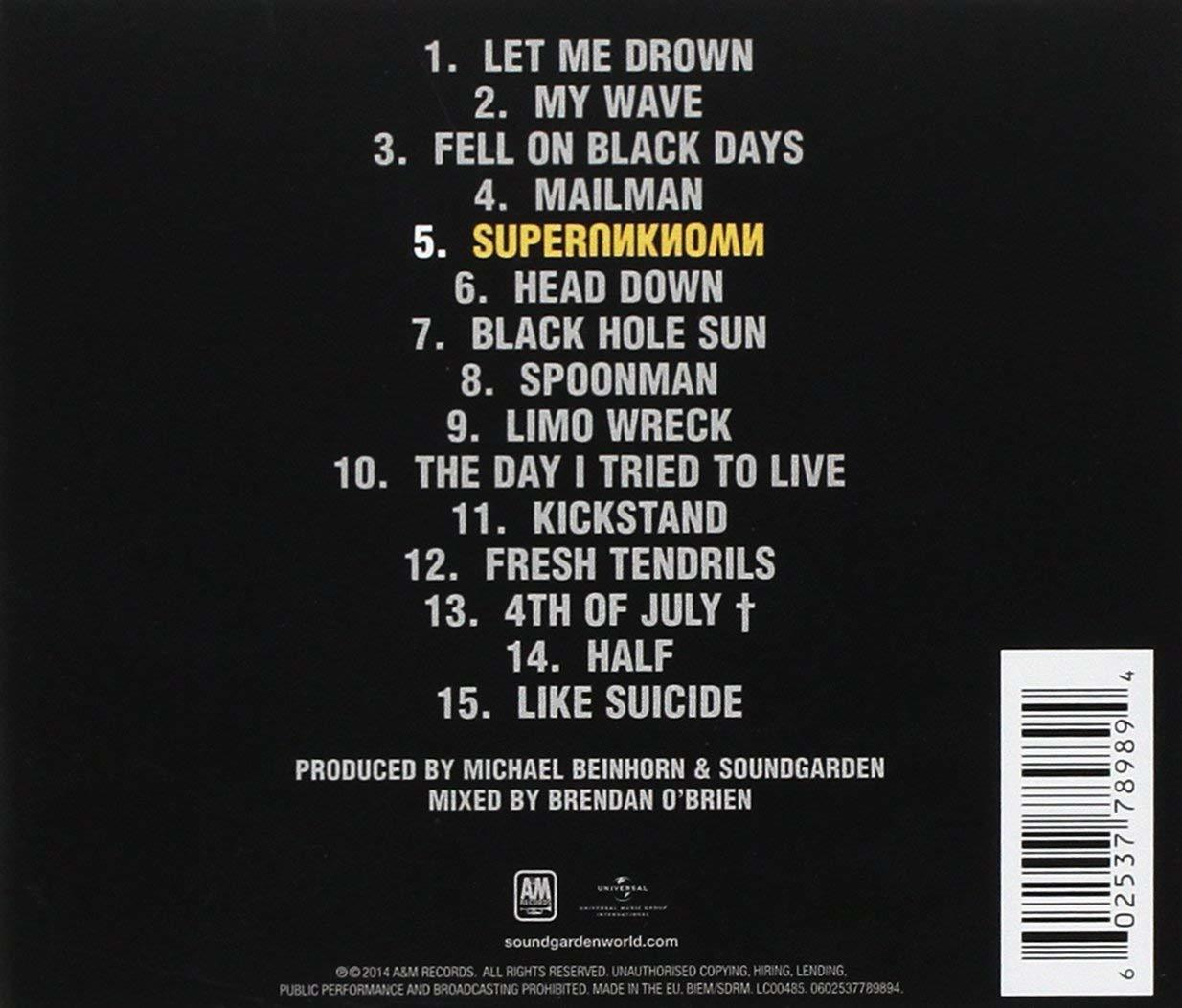 Liste des pistes sur fond noir avec texte blanc, avec titres de chansons et crédits de production.